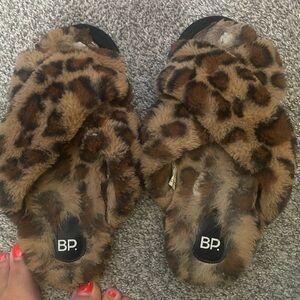 Well worn stinky smelly Leopard Print Fuzzy Slippers